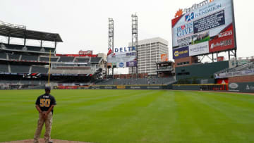 ATLANTA, GA - APRIL 04: A member of field security stands near right field wearing a shirt commemorating the 50th anniversary of Dr. Martin Luther King, Jr.'s assassination prior to the game between the Atlanta Braves and the Washington Nationals at SunTrust Park on April 4, 2018 in Atlanta, Georgia. (Photo by Kevin C. Cox/Getty Images)