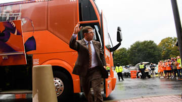 Oct 10, 2020; Clemson, SC, USA; Clemson head coach Dabo Swinney waves to fans as he and his players arrive before their game against Miami at Memorial Stadium. Mandatory Credit: Ken Ruinard-USA TODAY Sports