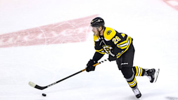 TORONTO, ONTARIO - AUGUST 19: Ondrej Kase #28 of the Boston Bruins carries the puck against the Carolina Hurricanes during the first period in Game Five of the Eastern Conference First Round during the 2020 NHL Stanley Cup Playoffs at Scotiabank Arena on August 19, 2020 in Toronto, Ontario. (Photo by Elsa/Getty Images)