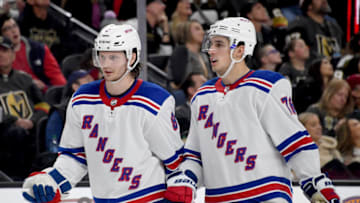 LAS VEGAS, NEVADA - DECEMBER 08: Jacob Trouba #8 and Brady Skjei #76 of the New York Rangers talk during a stop in play in the second period of their game against the Vegas Golden Knights at T-Mobile Arena on December 8, 2019 in Las Vegas, Nevada. The Rangers defeated the Golden Knights 5-0. (Photo by Ethan Miller/Getty Images)