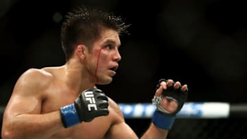 LOS ANGELES, CA - AUGUST 04: Henry Cejudo bleeds from the head in the third round against Demetrious Johnson in the UFC Flyweight Title Bout during UFC 227 at Staples Center on August 4, 2018 in Los Angeles, United States. (Photo by Joe Scarnici/Getty Images)
