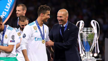 KIEV, UKRAINE - MAY 26: Real Madrid manager Zinedine Zidane embraces Cristiano Ronaldo following the UEFA Champions League final between Real Madrid and Liverpool at the NSC Olimpiyskiy on May 26, 2018 in Kiev, Ukraine. (Photo by Chris Brunskill Ltd/Getty Images)