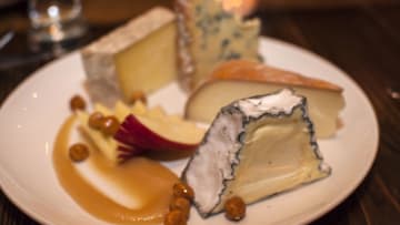 Cheese from Eleven Brothers, Pyramid Scheme, Landau and Madison at the end of a three-course dinner at Hen of the Wood in Waterbury on Thursday, March 31, 2016.Bur20160331insider10