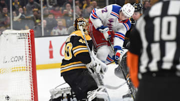 BOSTON, MA - JANUARY 19: Filip Chytil #72 of the New York Rangers scores a goal and collides into Tuukka Rask #40 of the Boston Bruins at the TD Garden on January 19, 2019 in Boston, Massachusetts. (Photo by Steve Babineau/NHLI via Getty Images)