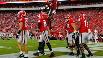 James Cook celebrates his touchdown with Justin Shaffer during the first half against the South Carolina Gamecocks. (Photo by Todd Kirkland/Getty Images)