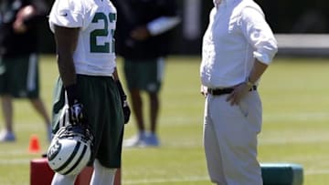 Jun 14, 2016; Florham Park, NJ, USA; New York Jets running back Matt Forte (22) talks to Jets owner Woddy Johnson during OTA at Atlantic Health Jets Training Center. Mandatory Credit: Noah K. Murray-USA TODAY Sports