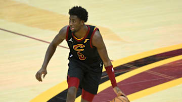 Mar 30, 2022; Cleveland, Ohio, USA; Cleveland Cavaliers guard Caris LeVert (3) dribbles the ball in the third quarter against the Dallas Mavericks at Rocket Mortgage FieldHouse. Mandatory Credit: David Richard-USA TODAY Sports