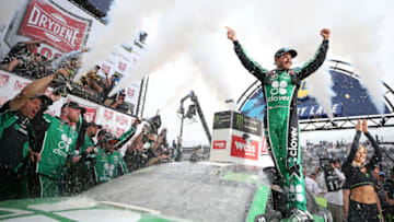 DOVER, DELAWARE - OCTOBER 06: Kyle Larson, driver of the #42 Clover Chevrolet, celebrates in Victory Lane after winning the Monster Energy NASCAR Cup Series Drydene 400 at Dover International Speedway on October 06, 2019 in Dover, Delaware. (Photo by Matt Sullivan/Getty Images)