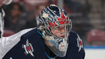 SUNRISE, FL - DECEMBER 7: A detailed view of the helmet of goaltender Eric Comrie #1 of the Winnipeg Jets as he looks up ice during first period action against the Florida Panthers at the BB&T Center on December 7, 2017 in Sunrise, Florida. Thew Panthers defeated the Jets 6-4. (Photo by Joel Auerbach/Getty Images)