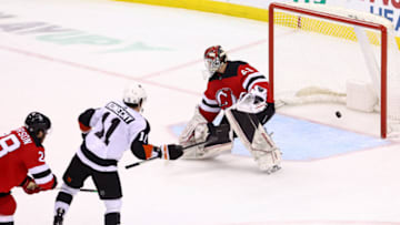 Dec 15, 2022; Newark, New Jersey, USA; Philadelphia Flyers right wing Travis Konecny (11) scores a goal on New Jersey Devils goaltender Vitek Vanecek (41) during the third period at Prudential Center. Mandatory Credit: Ed Mulholland-USA TODAY Sports