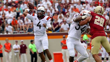 Sep 17, 2016; Blacksburg, VA, USA; Virginia Tech Hokies quarterback Jerod Evans (4) throws a pass during the second quarter against the Boston College Eagles at Lane Stadium. Mandatory Credit: Peter Casey-USA TODAY Sports