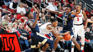 LOUISVILLE, KY - JANUARY 26: Xavier Johnson #1 and Khameron Davis #13 of the Pittsburgh Panthers defend against Khwan Fore #4 of the Louisville Cardinals in the first half of the game at KFC YUM! Center on January 26, 2019 in Louisville, Kentucky. (Photo by Joe Robbins/Getty Images)