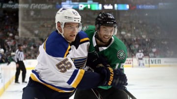 DALLAS, TX - SEPTEMBER 18: Colton Parayko #55 of the St. Louis Blues skates the puck against Jason Dickinson #16 of the Dallas Stars during a preseason game at American Airlines Center on September 18, 2018 in Dallas, Texas. (Photo by Ronald Martinez/Getty Images)