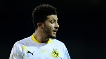 BRAUNSCHWEIG, GERMANY - DECEMBER 22: Jadon Sancho of Borussia Dortmund looks dejected during the DFB Cup second round match between Eintracht Braunschweig and Borussia Dortmund at Eintracht-Stadion on December 22, 2020 in Braunschweig, Germany. Sporting stadiums around Germany remain under strict restrictions due to the Coronavirus Pandemic as Government social distancing laws prohibit fans inside venues resulting in games being played behind closed doors. (Photo by Oliver Hardt/Getty Images)