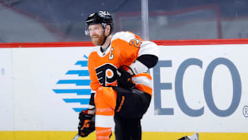 PHILADELPHIA, PENNSYLVANIA - JANUARY 30: Claude Giroux #28 of the Philadelphia Flyers stretches during warm ups before the game against the New York Islanders at Wells Fargo Center on January 30, 2021 in Philadelphia, Pennsylvania.The Philadelphia Flyers defeated the New York Islanders 3-2 in overtime. (Photo by Tim Nwachukwu/Getty Images)