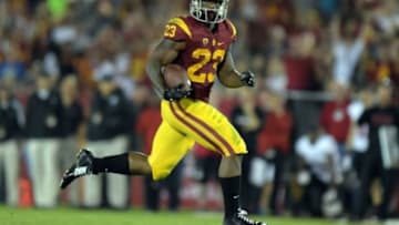 Sep 5, 2015; Los Angeles, CA, USA; Southern California Trojans tailback Tre Madden (23) scores on a 65-yard touchdown run in the second quarter against the Arkansas State Red Wolves at Los Angeles Memorial Coliseum. Mandatory Credit: Kirby Lee-USA TODAY Sports