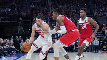SACRAMENTO, CALIFORNIA - DECEMBER 02: Zach LaVine #8 of the Chicago Bulls looks to dribble around Richaun Holmes #22 of the Sacramento Kings during the second half of an NBA basketball game at Golden 1 Center on December 02, 2019 in Sacramento, California. NOTE TO USER: User expressly acknowledges and agrees that, by downloading and or using this photograph, User is consenting to the terms and conditions of the Getty Images License Agreement. (Photo by Thearon W. Henderson/Getty Images)
