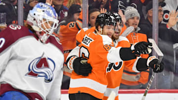 Dec 5, 2022; Philadelphia, Pennsylvania, USA; Philadelphia Flyers center Tanner Laczynski (58) celebrates his goal with left wing Joel Farabee (86) against Colorado Avalanche goaltender Alexandar Georgiev (40) during the first period at Wells Fargo Center. Mandatory Credit: Eric Hartline-USA TODAY Sports