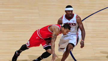 Detroit Pistons Derrick Rose and Joe Johnson playing against each other in the 2011 NBA playoffs. (Photo by Scott Cunningham/NBAE via Getty Images)
