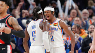 OKC Thunder guard Shai Gilgeous-Alexander (2) and Oklahoma City Thunder guard Luguentz Dort (5) Alonzo Adams-USA TODAY Sports