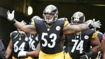 October 7, 2012; Pittsburgh, PA, USA; Pittsburgh Steelers center Maurkice Pouncey (53) leads the team onto the field against the Philadelphia Eagles during the first quarter at Heinz Field. Mandatory Credit: Charles LeClaire-USA TODAY Sports