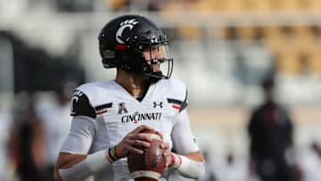 ORLANDO, FL - NOVEMBER 21: Desmond Ridder #9 of the Cincinnati Bearcats drops back to pass against the Central Florida Knights at Bounce House-FBC Mortgage Field on November 21, 2020 in Orlando, Florida. (Photo by Alex Menendez/Getty Images)