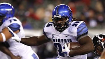 Oct 4, 2014; Cincinnati, OH, USA; Memphis Tigers running back Jarvis Cooper (25) carries the ball in the during the second half against the Cincinnati Bearcats at Paul Brown Stadium. Memphis won 41-14. Mandatory Credit: Aaron Doster-USA TODAY Sports