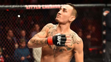 DETROIT, MI - DECEMBER 02: Max Holloway signals to the crowd as he enters the Octagon prior to facing Jose Aldo of Brazil in their UFC featherweight championship bout during the UFC 218 event inside Little Caesars Arena on December 02, 2017 in Detroit, Michigan. (Photo by Josh Hedges/Zuffa LLC/Zuffa LLC via Getty Images)