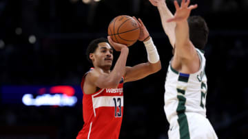 WASHINGTON, DC - NOVEMBER 20: Jordan Poole #13 of the Washington Wizards shoots against the Milwaukee Bucks during the first half at Capital One Arena on November 20, 2023 in Washington, DC. NOTE TO USER: User expressly acknowledges and agrees that, by downloading and or using this photograph, User is consenting to the terms and conditions of the Getty Images License Agreement. (Photo by Patrick Smith/Getty Images)