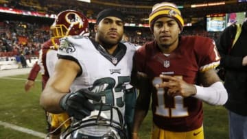 Dec 20, 2014; Landover, MD, USA; Washington Redskins wide receiver DeSean Jackson (11) and Philadelphia Eagles tight end James Casey (85) pose for a picture after their game at FedEx Field. The Redskins won 27-24. Mandatory Credit: Geoff Burke-USA TODAY Sports