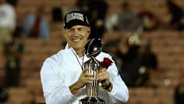 PASADENA, CA - JANUARY 01: Michigan State Spartans head coach Mark Dantonio celebrates with the Rose Bowl Game trophy after defeating the Stanford Cardinal 24-20 in the 100th Rose Bowl Game presented by Vizio at the Rose Bowl on January 1, 2014 in Pasadena, California. (Photo by Stephen Dunn/Getty Images)