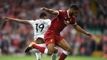 LIVERPOOL, ENGLAND - OCTOBER 14: Marcus Rashford of Manchester United and Joe Gomez of Liverpool battle for possession during the Premier League match between Liverpool and Manchester United at Anfield on October 14, 2017 in Liverpool, England. (Photo by Shaun Botterill/Getty Images)
