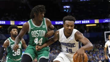 Nov 3, 2021; Orlando, Florida, USA;Boston Celtics center Robert Williams III (44) defends Orlando Magic center Wendell Carter Jr. (34) during the second quarter at Amway Center. Mandatory Credit: Kim Klement-USA TODAY Sports
