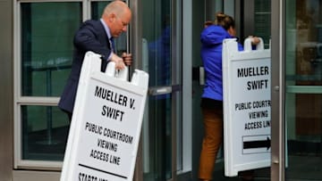 DENVER, CO - AUGUST 07: Courthouse staff remove signs regarding the civil case of Taylor Swift vs David Mueller at the Alfred A. Arraj Courthouse on August 7, 2017 in Denver, Colorado. Swift is suing David Mueller, a former DJ, for assault and battery after he allegedly groped her when they had a photo taken together June 2, 2013 at the Pepsi Center in Denver. Mueller is also suing Swift for allegedly pressuring his former employer, radio station KYGO, to fire him following the incident. (Photo by Joe Mahoney/Getty Images)