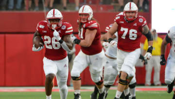LINCOLN, NE - SEPTEMBER 14: Running back Dedrick Mills #26 of the Nebraska Cornhuskers runs against the Northern Illinois Huskies at Memorial Stadium on September 14, 2019 in Lincoln, Nebraska. (Photo by Steven Branscombe/Getty Images)