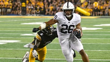 IOWA CITY, IA - SEPTEMBER 23: Iowa Hawkeyes' right cornerback tries to tackles Penn State running back Saquon Barkley (26) during a Big Ten Conference football game between the Penn State Nittany Lions and the University of Iowa Hawkeyes on September 23, 2017, at Kinnick Stadium, Iowa City, IA. Penn State won on the final play, 21-19. (Photo by Keith Gillett/Icon Sportswire via Getty Images)