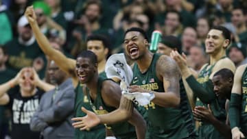 EAST LANSING, MI - JANUARY 4: Nick Ward #44 and Jaren Jackson Jr. #2 of the Michigan State Spartans celebrate from the bench during the game against the Maryland Terrapins at Breslin Center on January 4, 2018 in East Lansing, Michigan. (Photo by Rey Del Rio/Getty Images)
