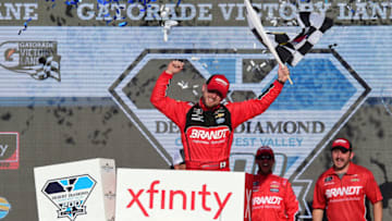 AVONDALE, ARIZONA - NOVEMBER 09: Justin Allgaier, driver of the #7 BRANDT Professional Agriculture Chevrolet, celebrates in Victory Lane after winning the NASCAR Xfinity Series Desert Diamond Casino West Valley 200 at ISM Raceway on November 09, 2019 in Avondale, Arizona. (Photo by Jared C. Tilton/Getty Images)