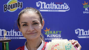 NEW YORK, NEW YORK - JULY 04: Woman's champion Michelle Lesco poses during the 2021 Nathans Famous Fourth of July International Hot Dog Eating Contest at Coney Island on July 04, 2021 in New York City. (Photo by John Lamparski/Getty Images)