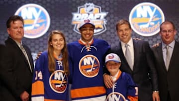 Jun 27, 2014; Philadelphia, PA, USA; Joshua Ho-Sang poses for a photo after being selected as the number twenty-eight overall pick to the New York Islanders in the first round of the 2014 NHL Draft at Wells Fargo Center. Mandatory Credit: Bill Streicher-USA TODAY Sports