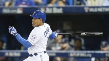 Oct 17, 2016; Toronto, Ontario, CAN; Toronto Blue Jays left fielder Ezequiel Carrera (3) hits a triple during the fifth inning in game three of the 2016 ALCS playoff baseball series against the Cleveland Indians at Rogers Centre. Mandatory Credit: John E. Sokolowski-USA TODAY Sports