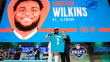 NASHVILLE, TENNESSEE - APRIL 25: Christian Wilkins of Clemson celebrates with NFL Commissioner Roger Goodell after being chosen #13 overall by the Miami Dolphins during the first round of the 2019 NFL Draft on April 25, 2019 in Nashville, Tennessee. (Photo by Andy Lyons/Getty Images)