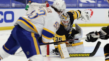 Mar 11, 2021; Buffalo, New York, USA; Pittsburgh Penguins goaltender Tristan Jarry (35) makes a save on Buffalo Sabres left wing Jeff Skinner (53) during the second period at KeyBank Center. Mandatory Credit: Timothy T. Ludwig-USA TODAY Sports