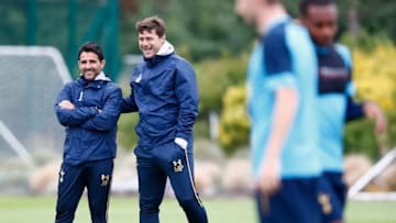 ENFIELD, ENGLAND - AUGUST 02: Manager Mauricio Pochettino smiles as he talks to Jesus Perez during the Tottenham Hotspur Training Session on August 2, 2016 in Enfield, England. (Photo by Tottenham Hotspur FC/Tottenham Hotspur FC via Getty Images)
