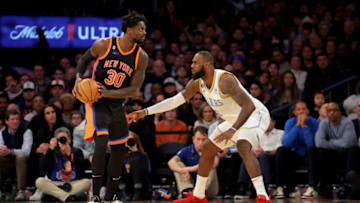 Jan 31, 2023; New York, New York, USA; New York Knicks forward Julius Randle (30) controls the ball against Los Angeles Lakers forward LeBron James (6) during the fourth quarter at Madison Square Garden. Mandatory Credit: Brad Penner-USA TODAY Sports