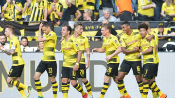 DORTMUND, GERMANY - APRIL 21: Jadon Sancho of Dortmund celebrates after scoring his team`s first goal with team mates during the Bundesliga match between Borussia Dortmund and Bayer 04 Leverkusen at Signal Iduna Park on April 21, 2018 in Dortmund, Germany. (Photo by TF-Images/TF-Images via Getty Images)