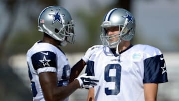 Jul 31, 2014; Oxnard, CA, USA; Dallas Cowboys receiver Dez Bryant (88) and quarterback Tony Romo (9) at training camp at the River Ridge Fields. Mandatory Credit: Kirby Lee-USA TODAY Sports