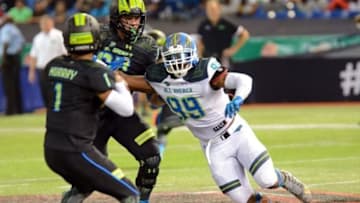 Jan 2, 2015; St. Petersburg, FL, USA; Team Highlight defensive end Byron Cowart (99) rushes the quarterback during the second half of the 2015 Under Armour All-America Game at Tropicana Field. Team Highlight defeated Team Armour 46-6. Mandatory Credit: Jonathan Dyer-USA TODAY Sports