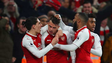 LONDON, ENGLAND - DECEMBER 22: Granit Xhaka of Arsenal (C) celebrates as he scores their second goal with team mates during the Premier League match between Arsenal and Liverpool at Emirates Stadium on December 22, 2017 in London, England. (Photo by Catherine Ivill/Getty Images)