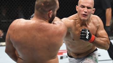 BOISE, ID - JULY 14: (R-L) Junior Dos Santos of Brazil punches Blagoy Ivanov in their heavyweight fight during the UFC Fight Night event inside CenturyLink Arena on July 14, 2018 in Boise, Idaho. (Photo by Josh Hedges/Zuffa LLC/Zuffa LLC via Getty Images)